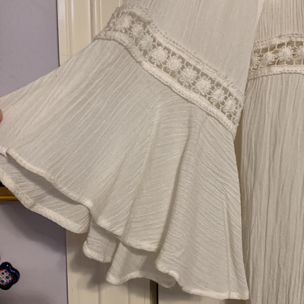 Bohemian top with floral details! New with tags!! - Picture 2 of 5